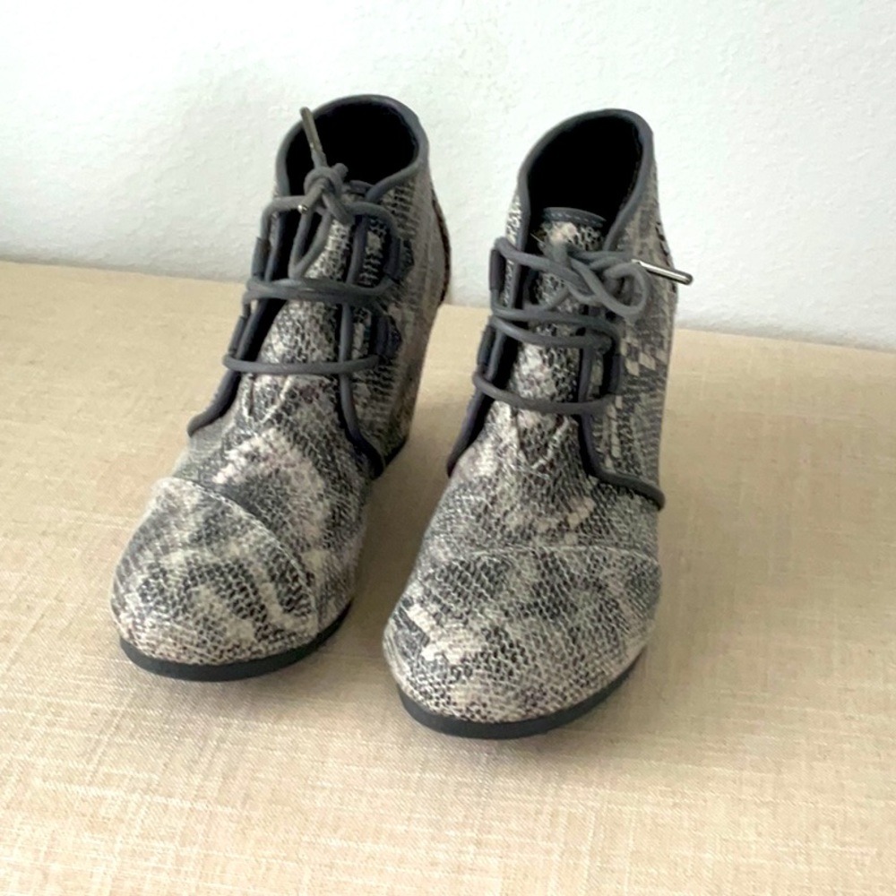 Tom’s size 7.5 snake skin booties